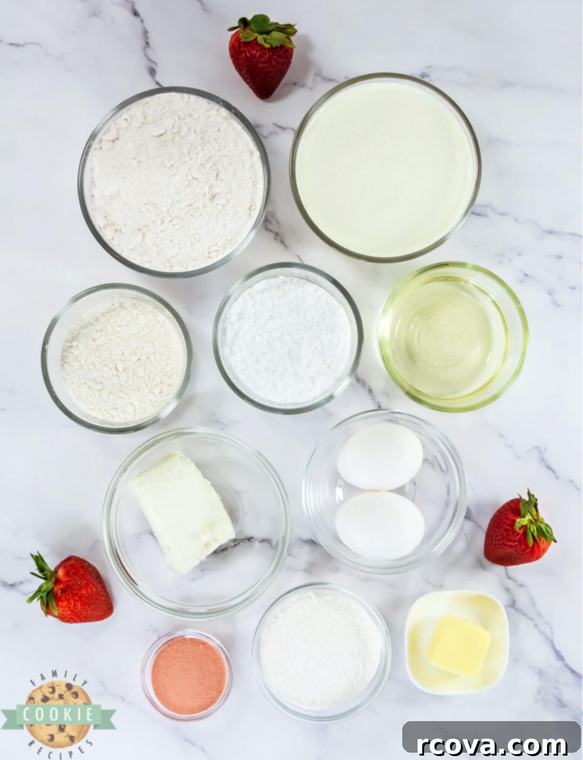 Bakery Style Strawberry Shortcake Cookies 3 Assortment of fresh ingredients for making Copycat Crumbl Strawberry Shortcake Cookies, including cake mix, cream cheese, heavy cream, and Jello mix.