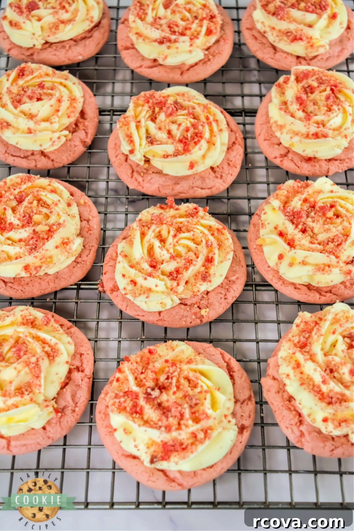Bakery Style Strawberry Shortcake Cookies 8 Baked Copycat Crumbl Strawberry Shortcake Cookies on a cooling rack, ready for frosting and streusel topping.
