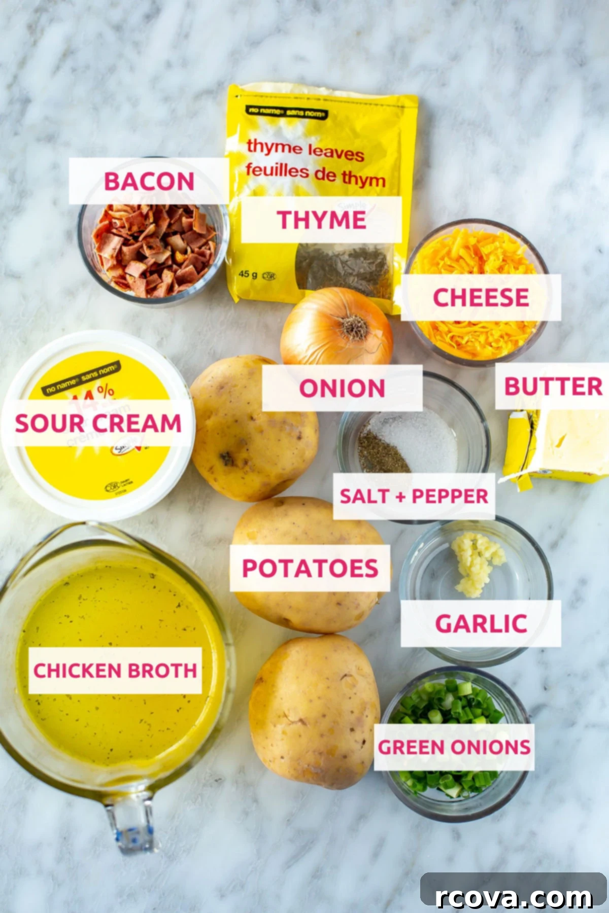 Your New Favorite Slow Cooker Potato Soup 3 Ingredients for crockpot potato soup laid out: fresh potatoes, butter, garlic, chicken broth, green onions, a whole onion, cheese, thyme, bacon, sour cream, salt and pepper.