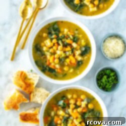 Hearty Chickpea Soup Your Way 11 Three bowls filled with chickpea soup with some pieces of bread on the side.