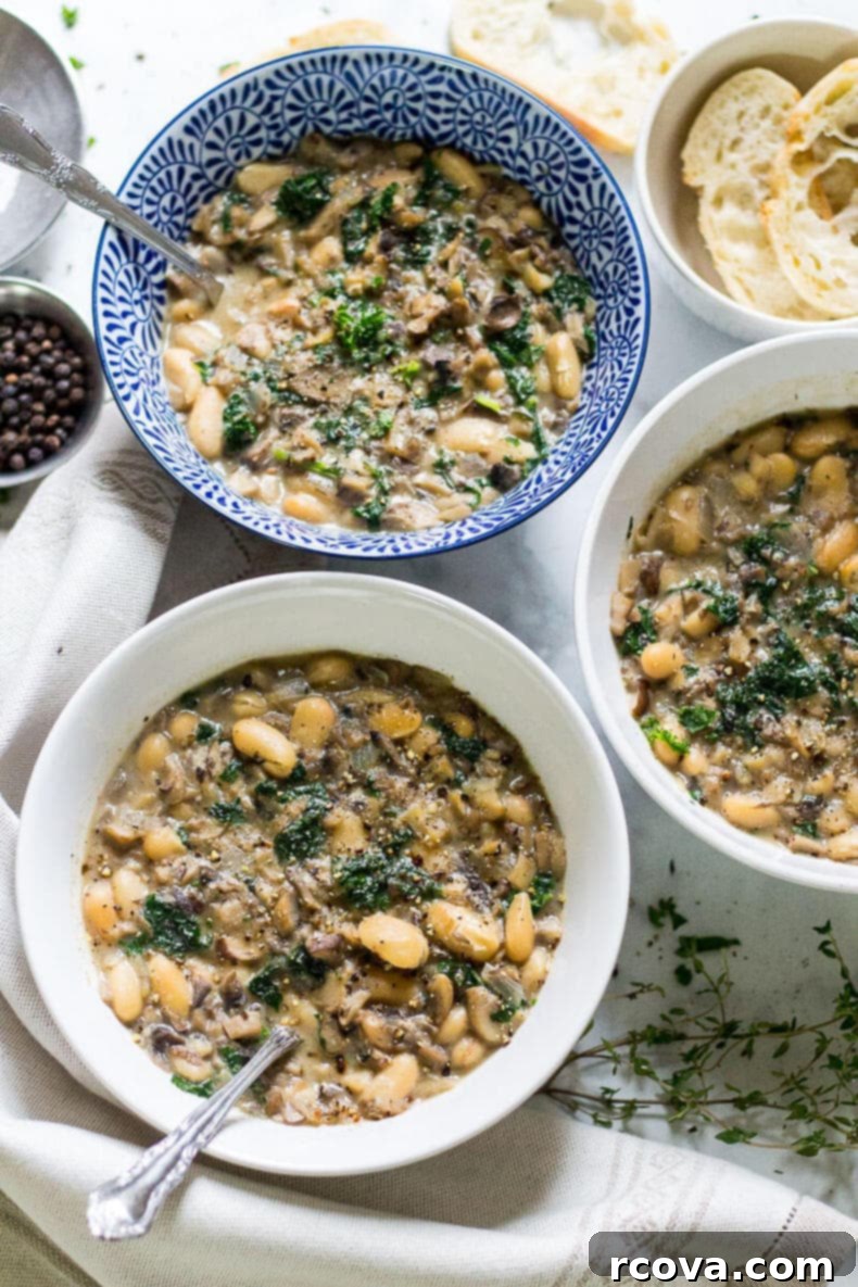 Deliciously Healthy Mushroom Recipes 22 Creamy Portobello Mushroom Soup garnished with fresh herbs.