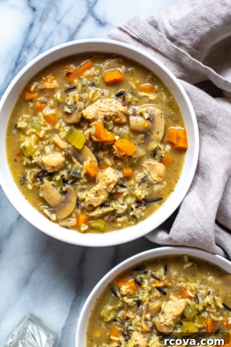 Deliciously Healthy Mushroom Recipes 23 Hearty Chicken Wild Rice Soup with vegetables and mushrooms.