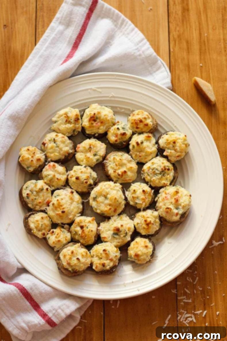 Deliciously Healthy Mushroom Recipes 6 The Keg Mushrooms Neptune Copycat appetizer, featuring creamy crab and shrimp stuffed mushrooms.