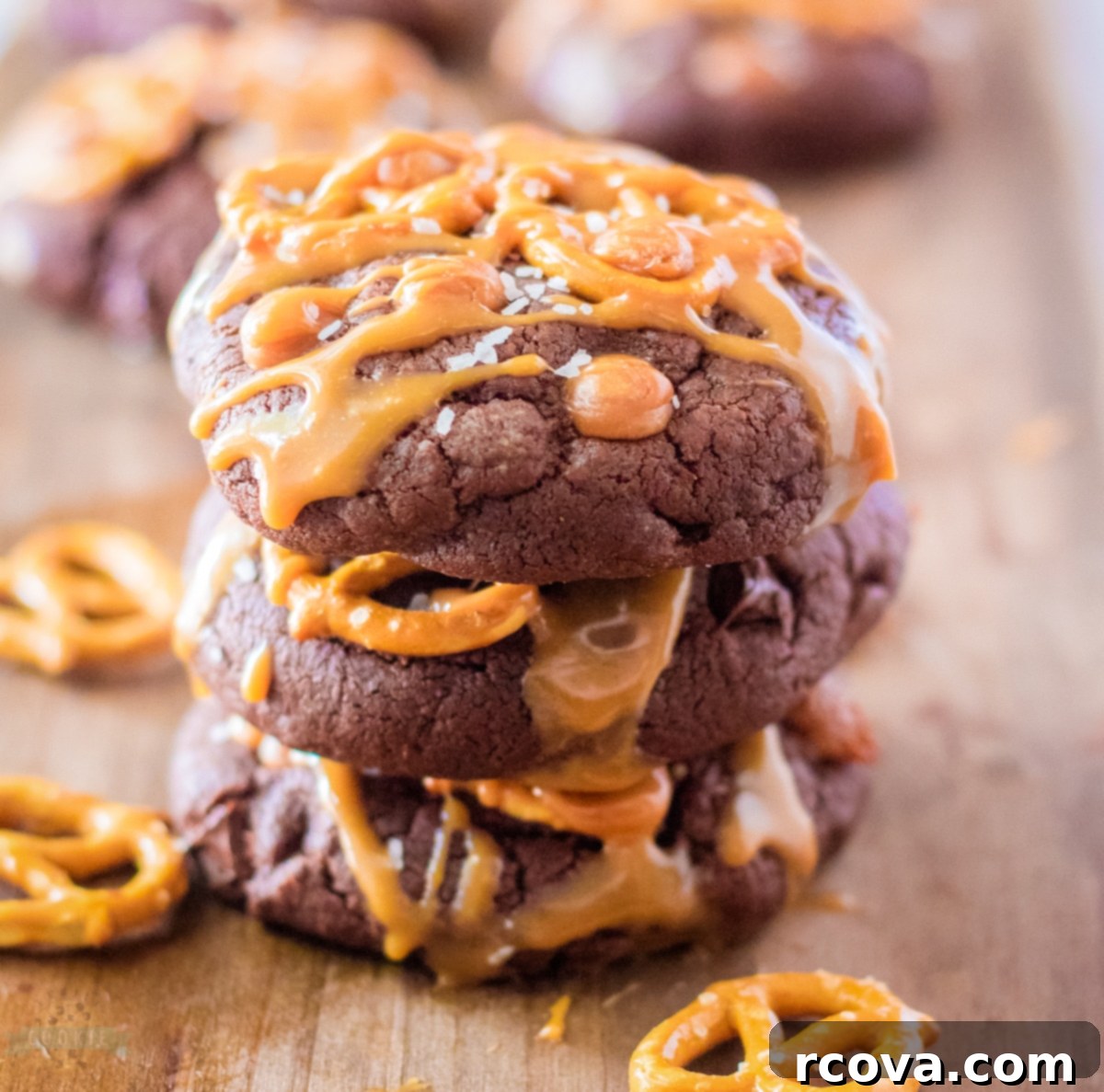 Fudgy Salted Caramel Brownie Cookies 3 A plate full of golden brown Salted Caramel Brownie Cookies, showing their rich texture.