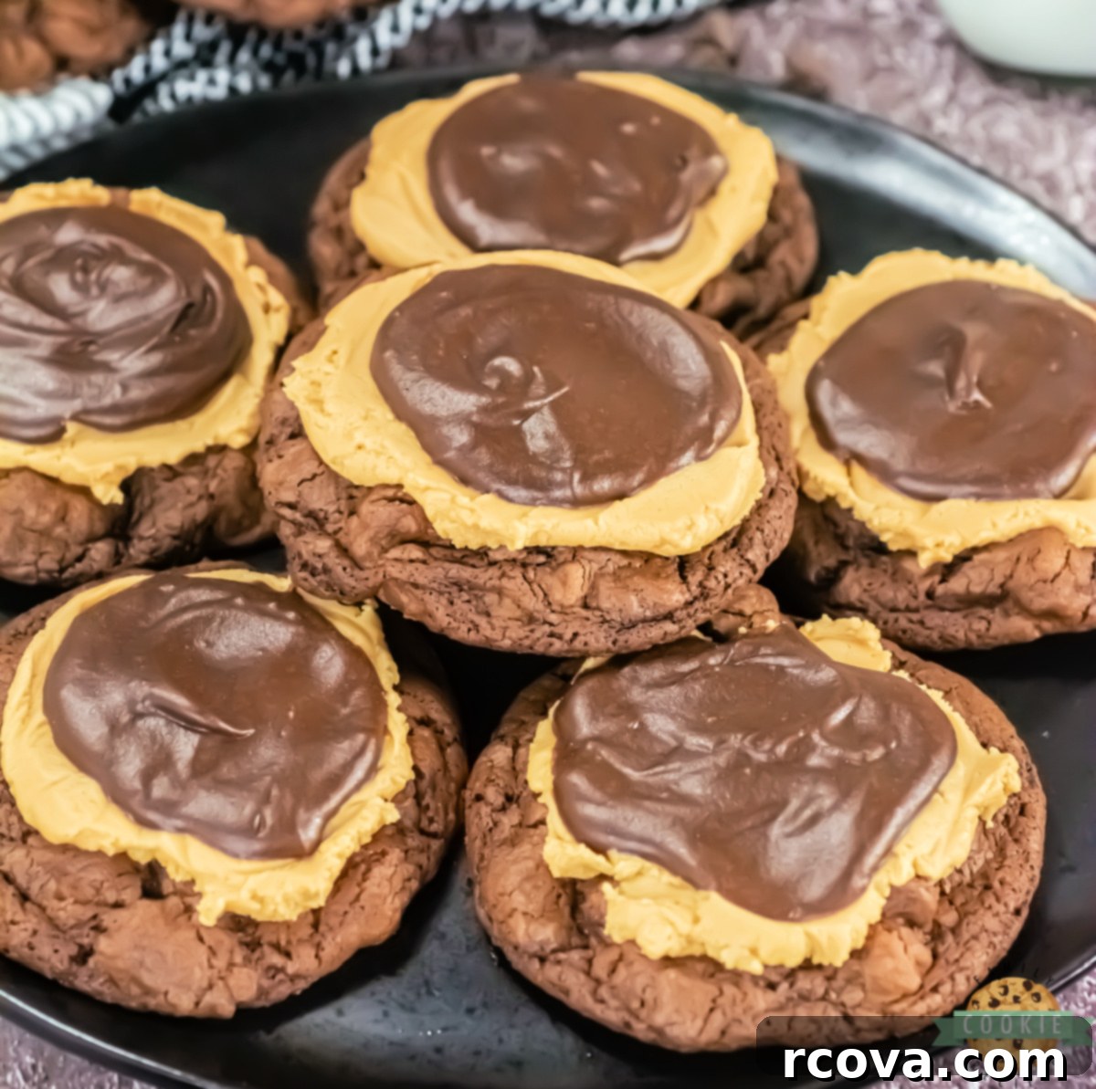 Peanut Butter Fudge Brownie Cookies 5 Crumbl Copycat Buckeye Brownie Cookies stacked, showing the distinct layers and generous size.