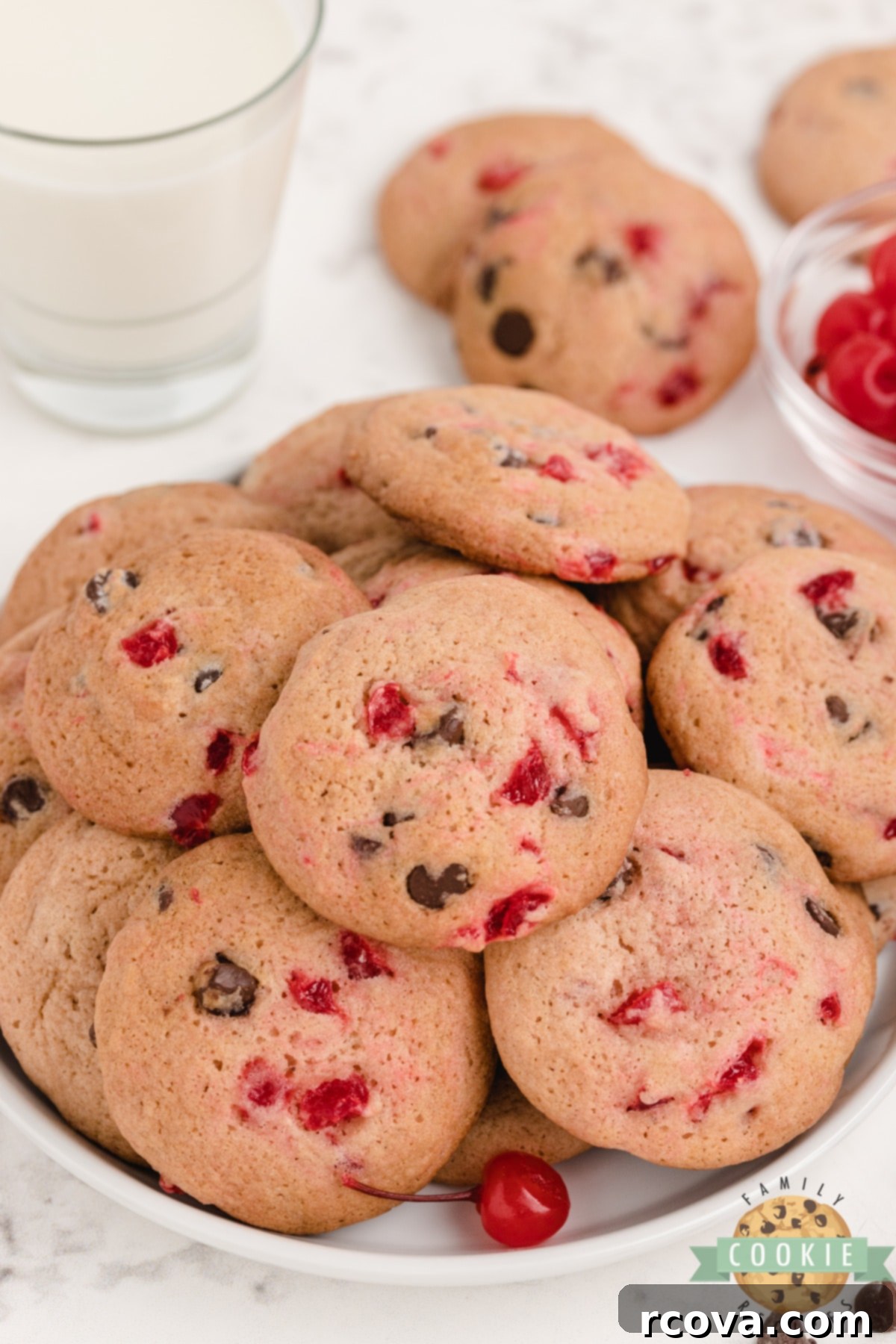 Decadent Cherry Chocolate Chip Cookies 3 Close-up of freshly baked Cherry Chocolate Chip Cookies on a cooling rack.