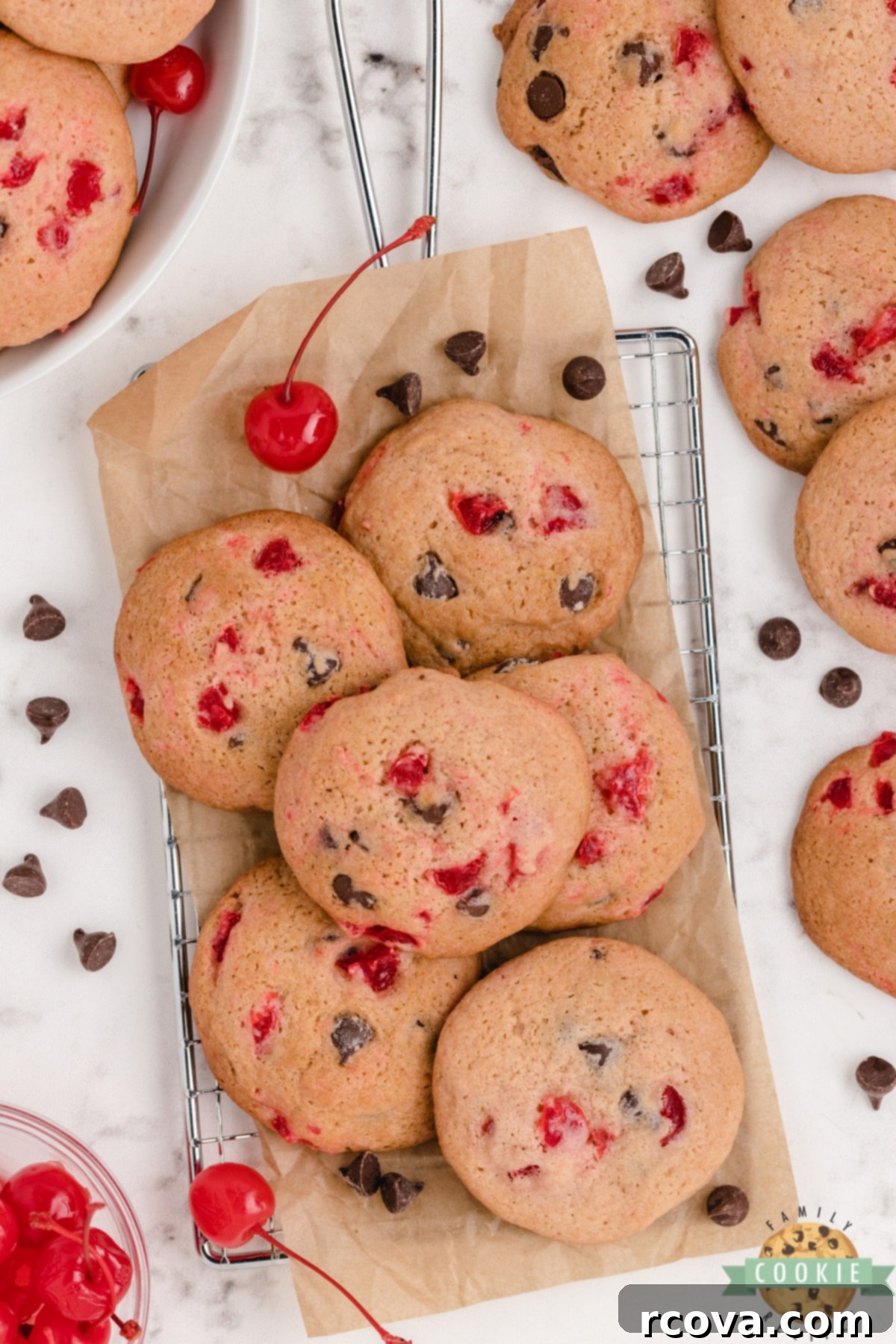 Decadent Cherry Chocolate Chip Cookies 8 Freshly baked Cherry Chocolate Chip Cookies cooling on a wire rack.