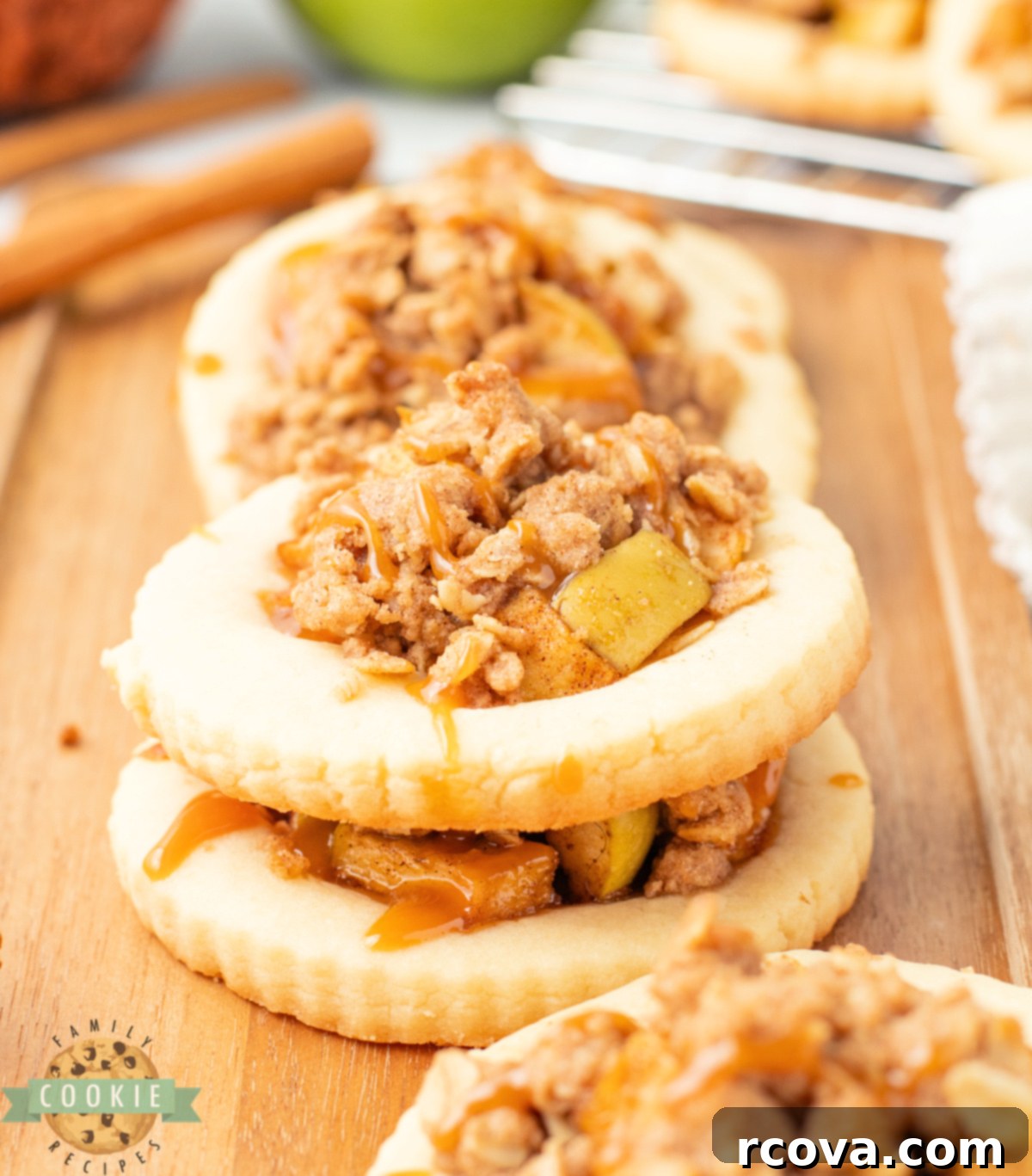 Spiced Apple Crumble Cookies 8 A stack of Apple Crumble Cookies with a caramel drizzle, perfect for sharing or as a treat.