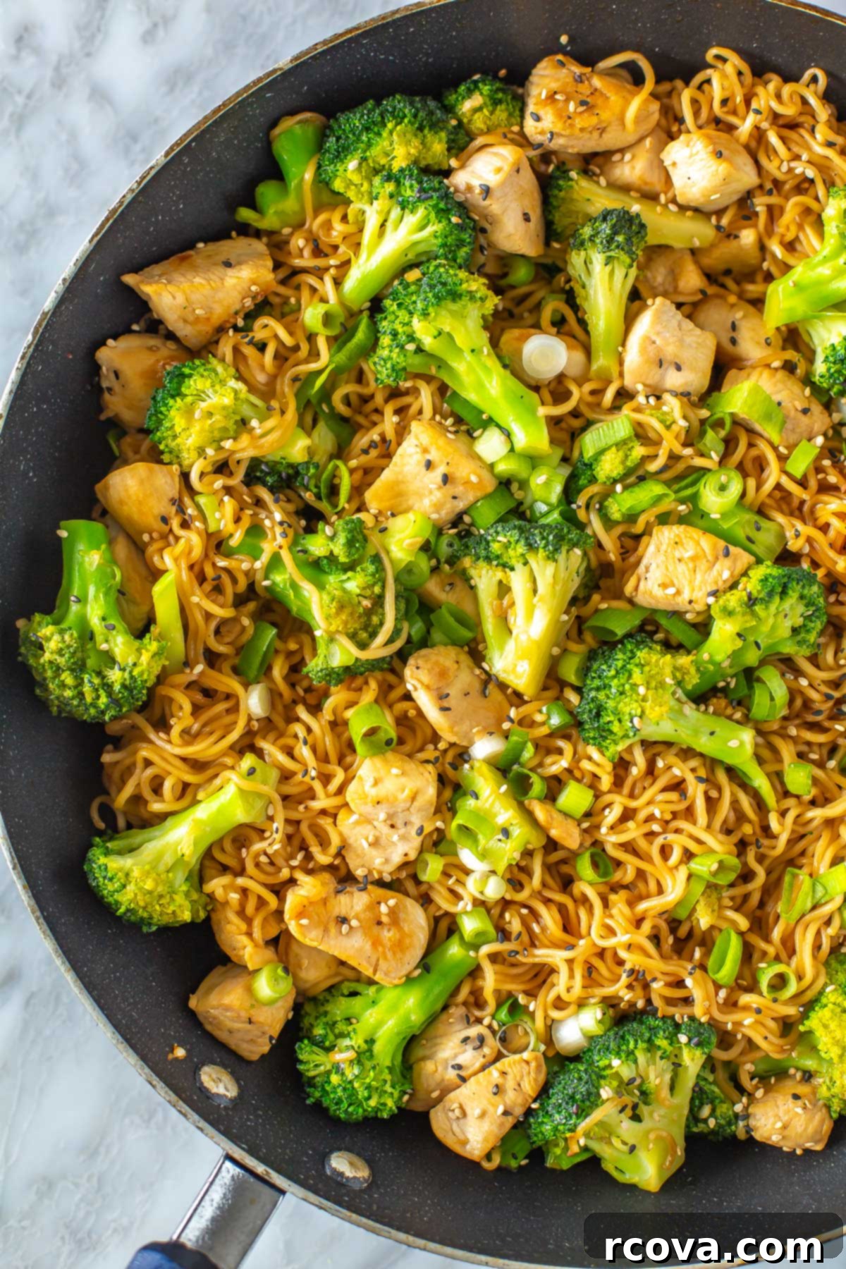 26 Easy and Healthy Pantry Dinners 15 A close-up of a skillet filled with chicken ramen stir fry.