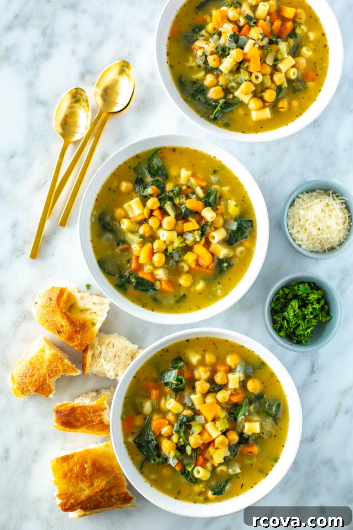 Cozy Winter Meals: Your Free Prep Guide 5 Three bowls filled with chickpea soup with some pieces of bread on the side.