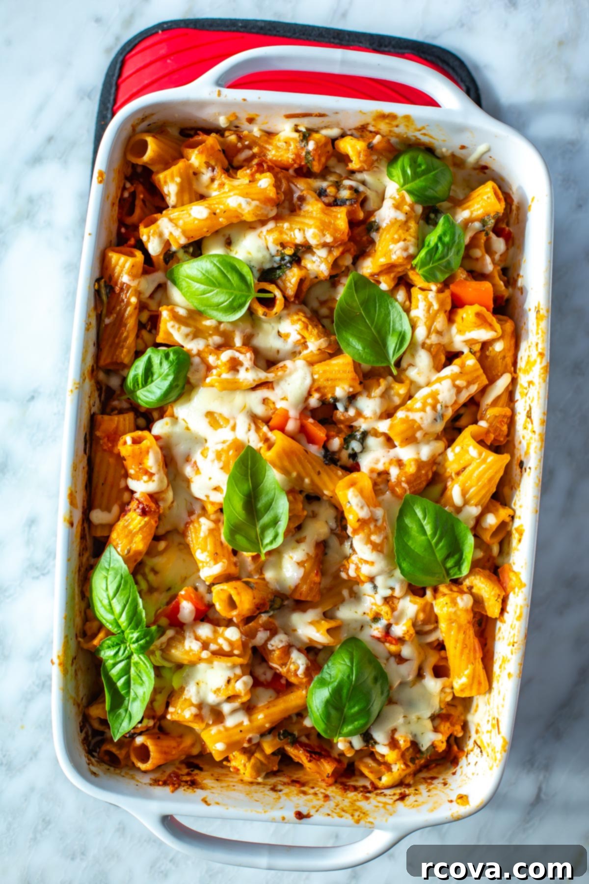 Cozy Winter Meals: Your Free Prep Guide 8 Chicken pasta bake in a a large casserole dish.