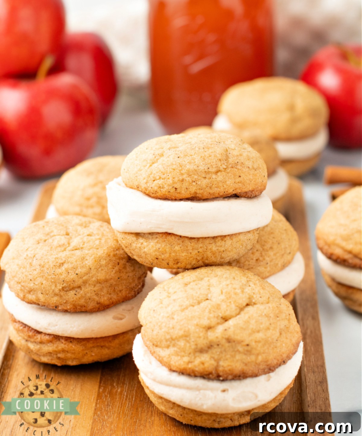 Ciderhouse Snickerdoodle Cream Pies 3 Stack of soft and chewy apple cider snickerdoodle cream pies showing the delicious frosting layer inside, ready to be enjoyed.