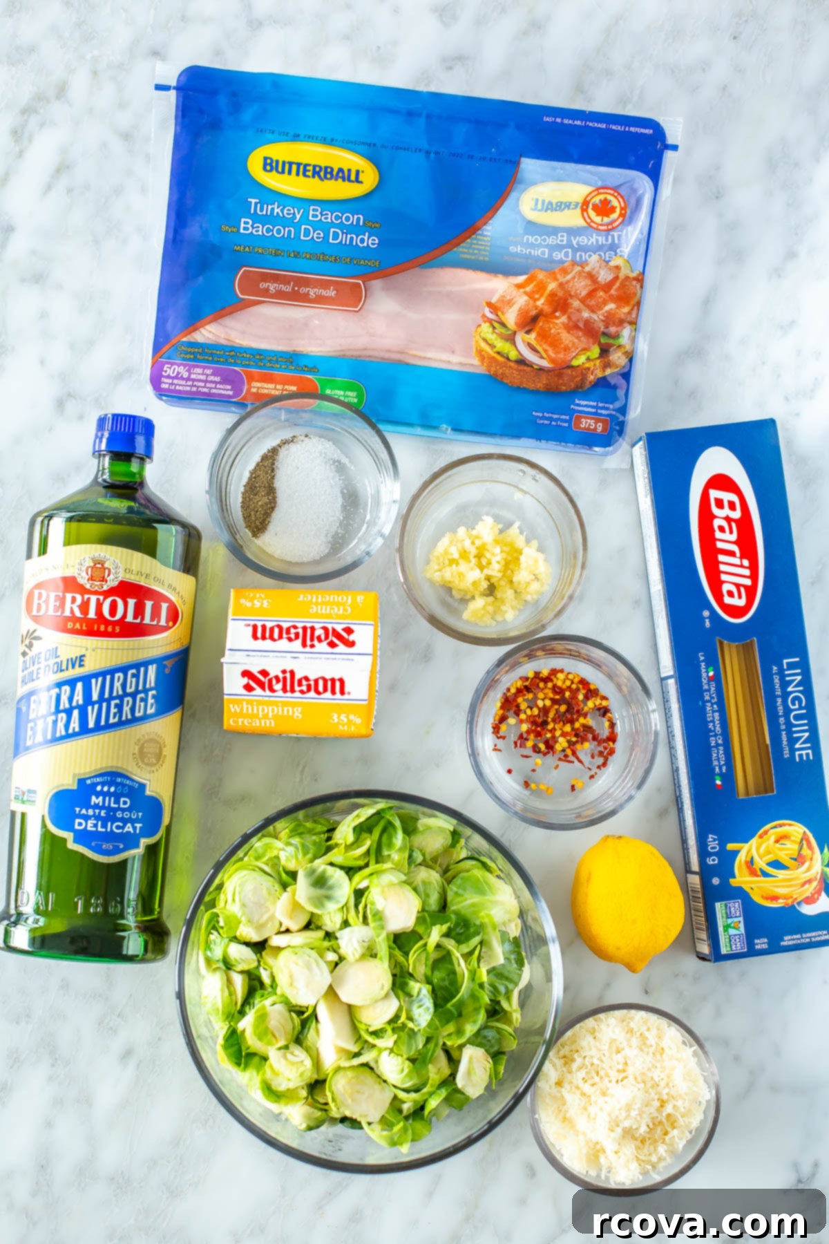 12 Grocery Hacks to Save Big in 2025 5 An assortment of colorful, fresh ingredients on a kitchen counter, including bright green brussels sprouts.