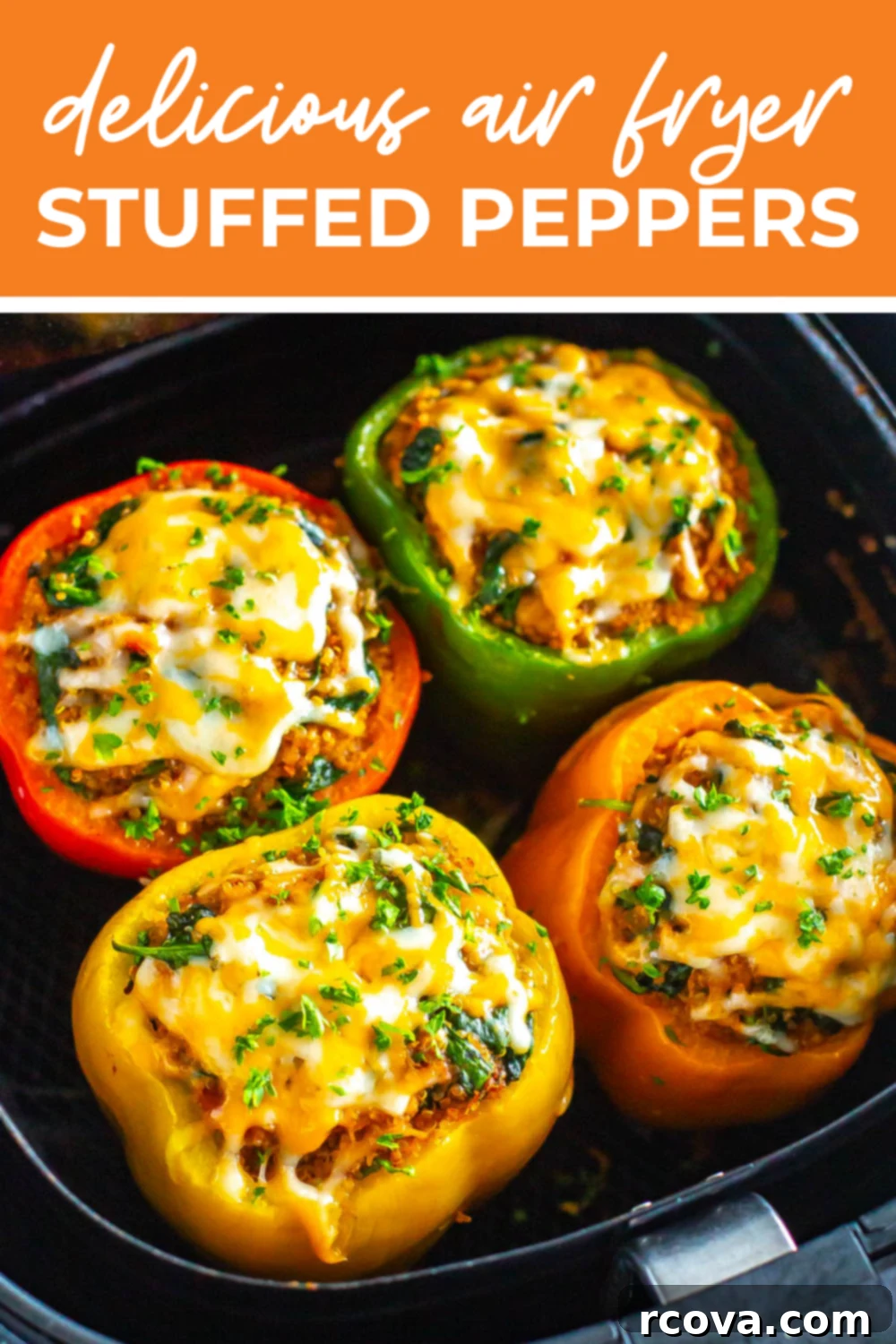 Effortless Air Fryer Stuffed Peppers 12 A close-up of stuffed peppers in an air fryer with the text "Delicious Air Fryer Stuffed Peppers" on top.