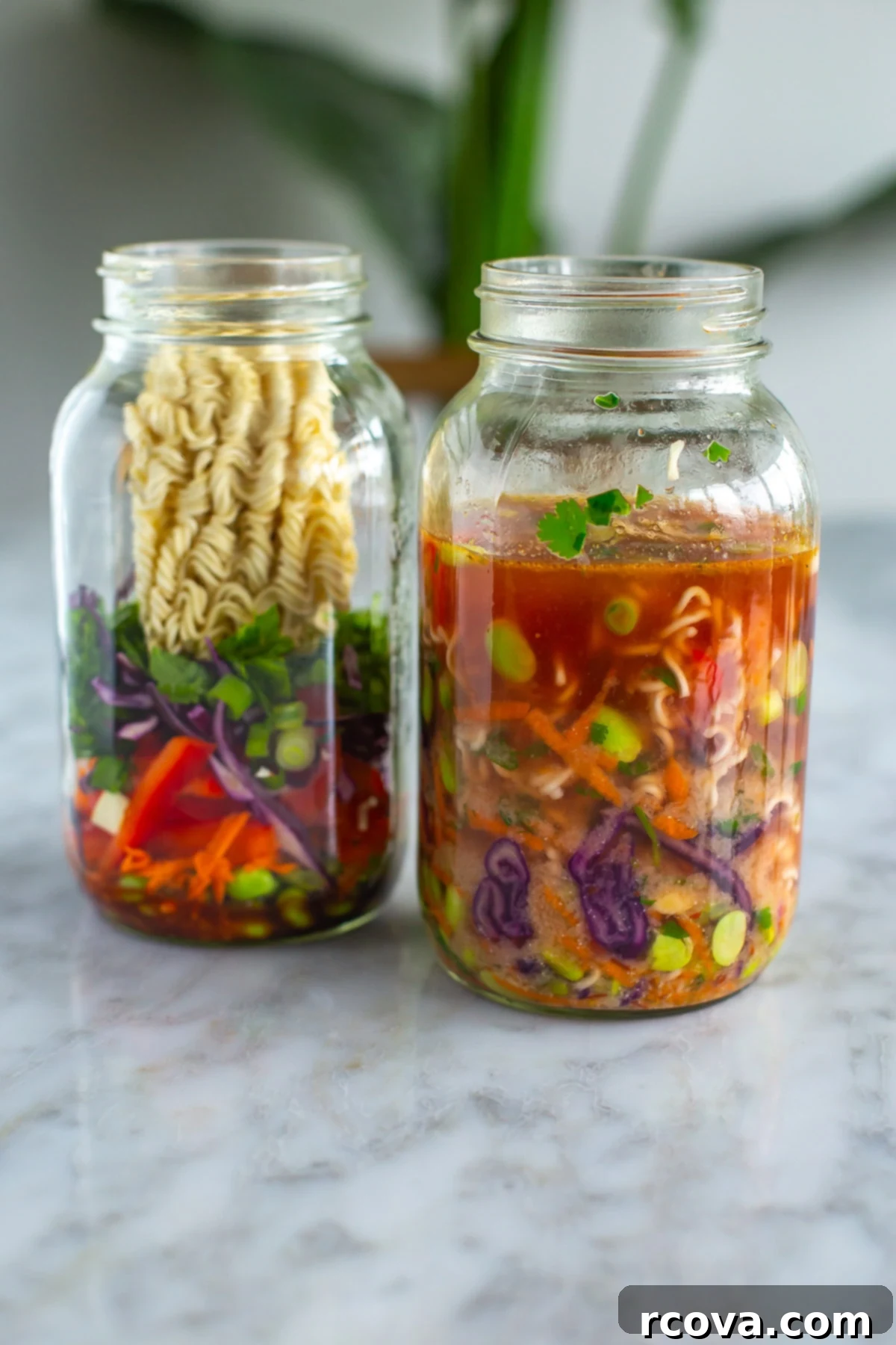 Homemade Instant Noodle Perfection 7 Two pre-prepared DIY instant noodle mason jars, one sealed and ready for storage, the other with boiling water recently added, steaming gently, demonstrating the instant preparation.