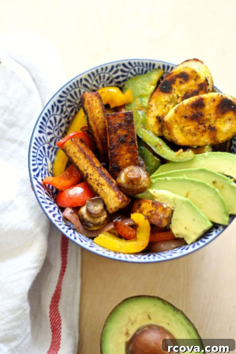 Tofu Transformed: 17 Irresistible Dishes 5 Caribbean BBQ Tofu Vegetable Bowl with vibrant colors.