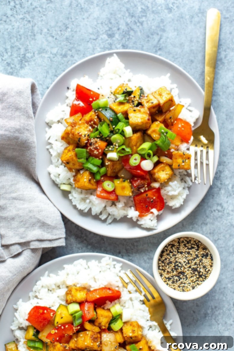 Tofu Transformed: 17 Irresistible Dishes 10 Ginger Sesame Tofu Stir Fry coated in a sticky sauce.