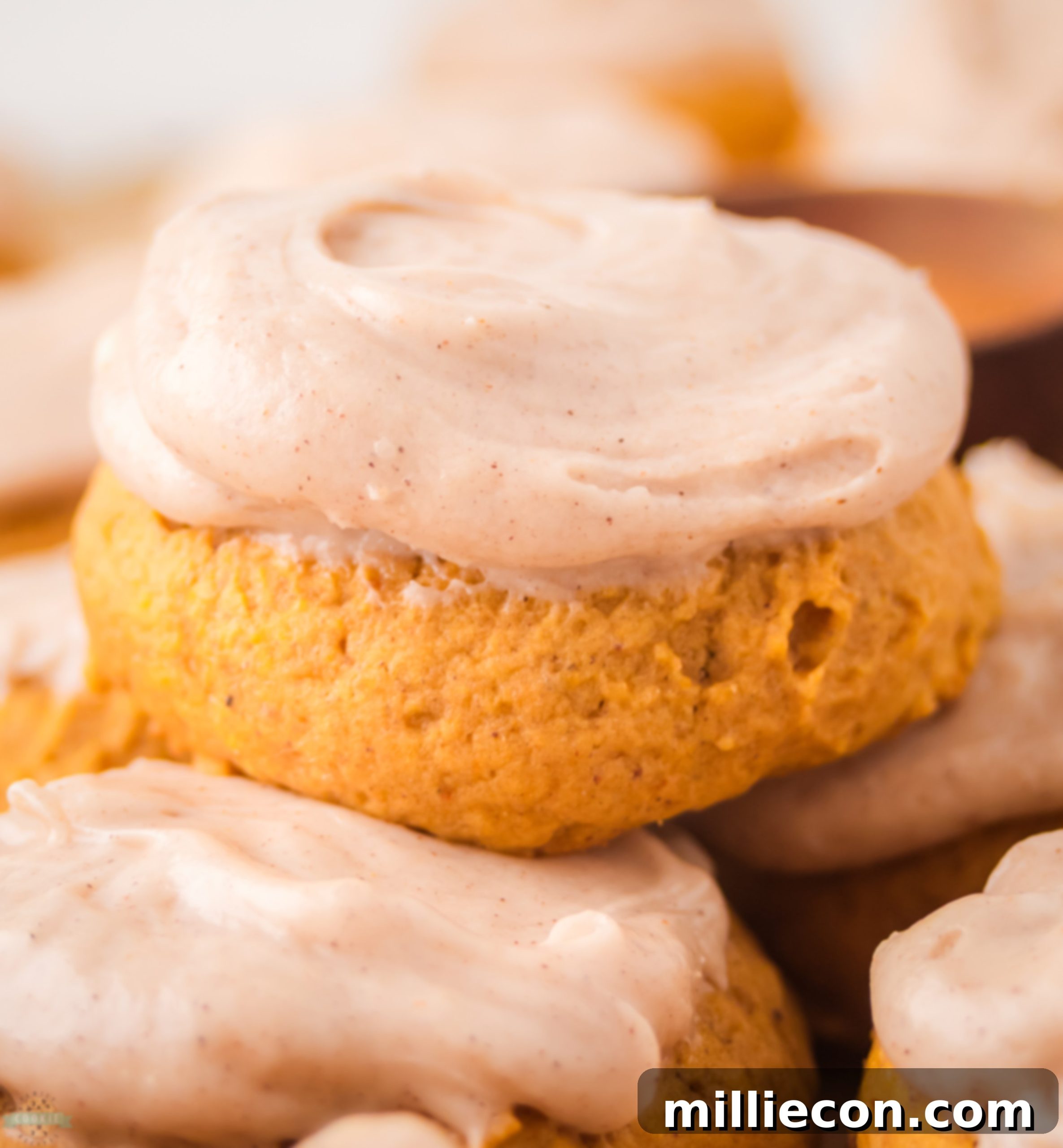 Cream Cheese Frosted Pumpkin Cookies 2 frosted pumpkin cookies