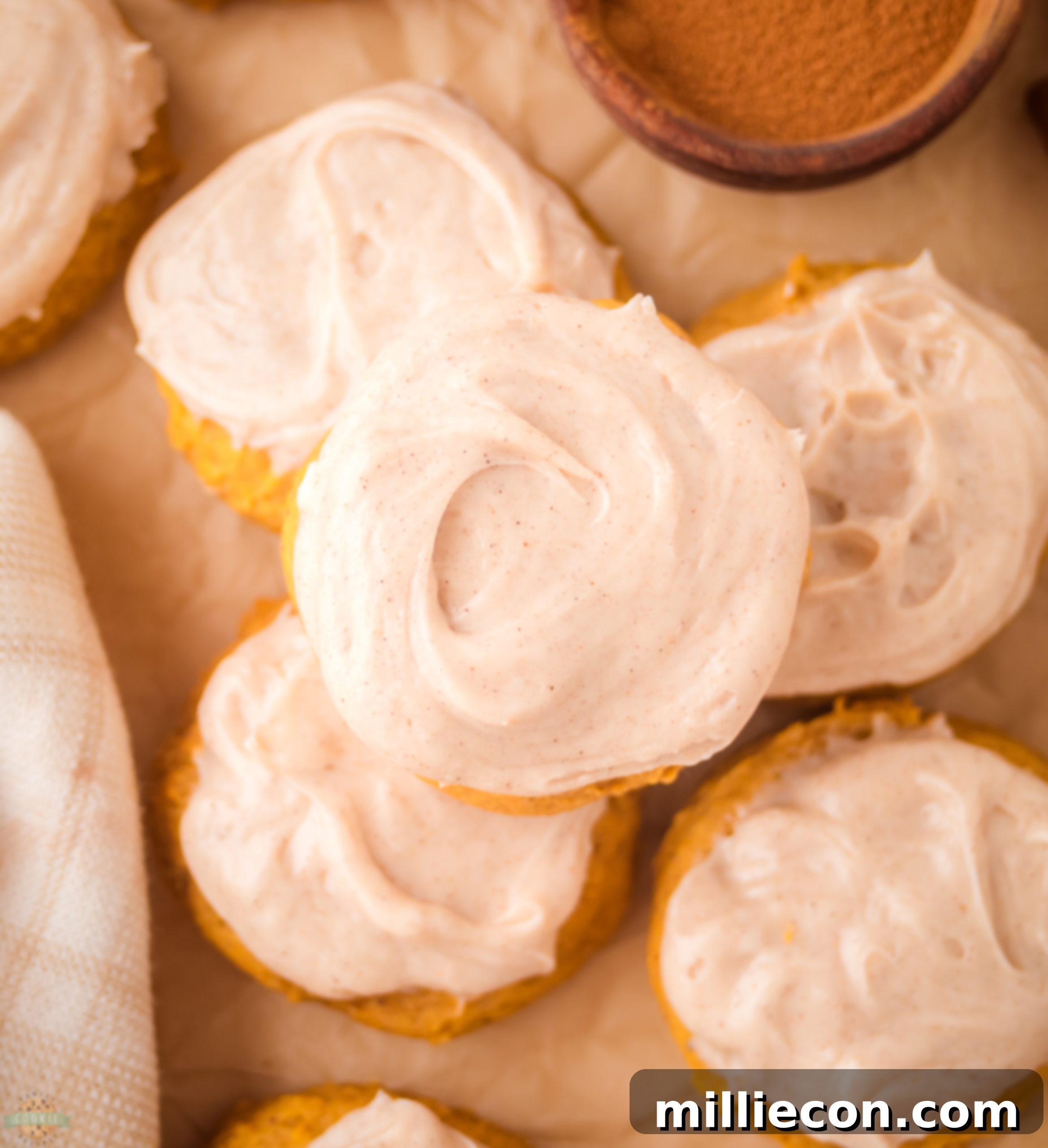 Cream Cheese Frosted Pumpkin Cookies 4 pile of frosted pumpkin cookies