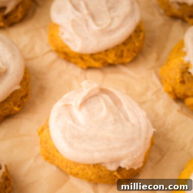 Cream Cheese Frosted Pumpkin Cookies 5 tray of frosted pumpkin cookies