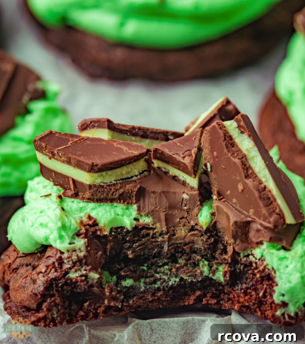 Grasshopper Delights 3 A plate of freshly baked Grasshopper Cookies, showcasing their vibrant green frosting and chocolate topping.