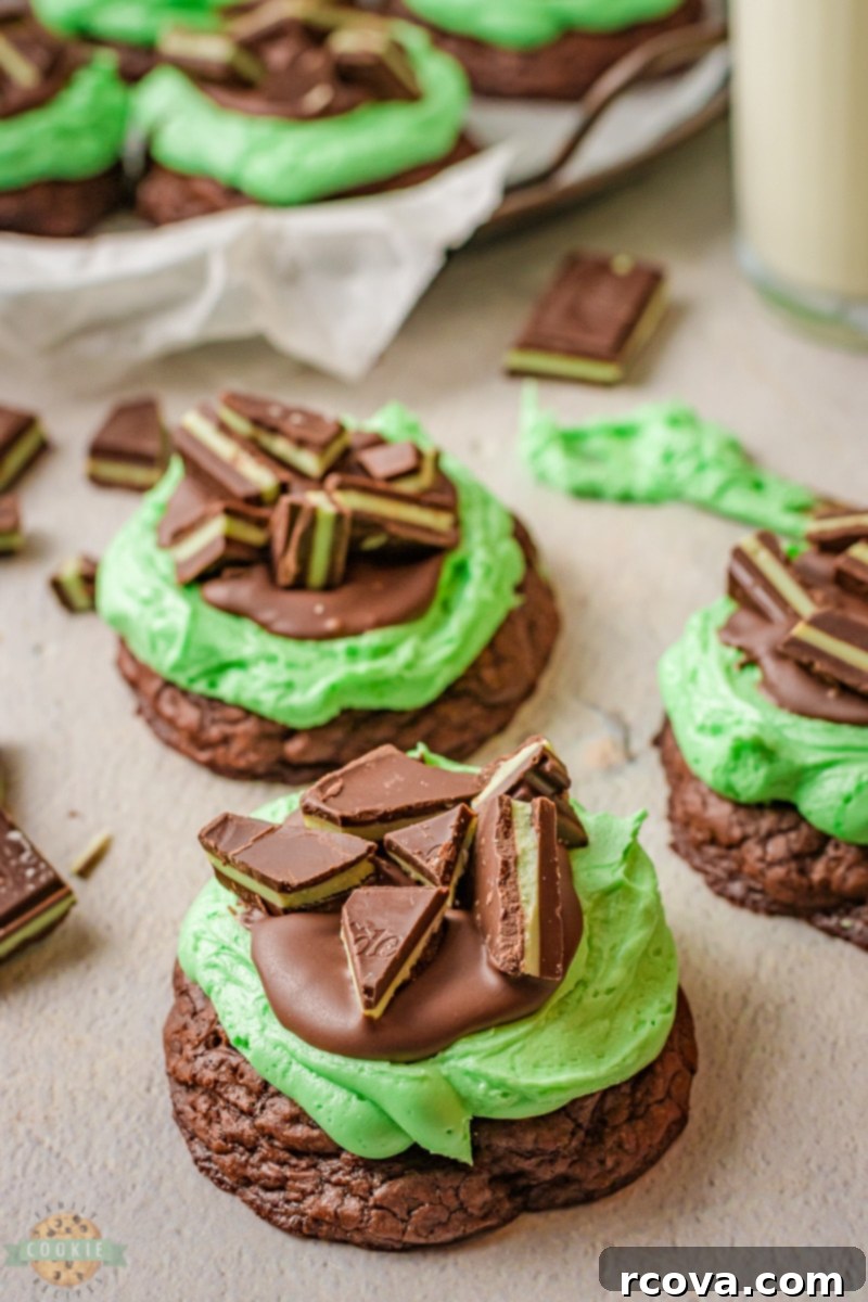 Grasshopper Delights 7 A tray of un-frosted Grasshopper Cookies, freshly baked and cooling on parchment paper.