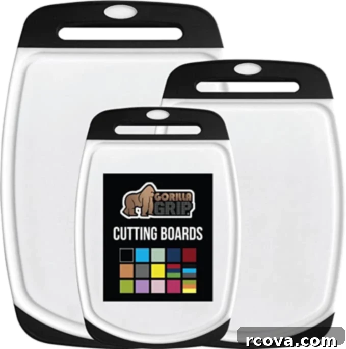 Ultimate Kitchen Setup 11 Three white cutting boards with black handles, featuring anti-slip properties.