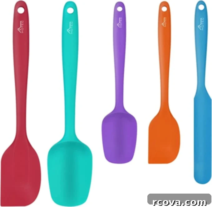 Ultimate Kitchen Setup 15 A set of silicone spatulas in different shapes and sizes for various cooking and baking needs.