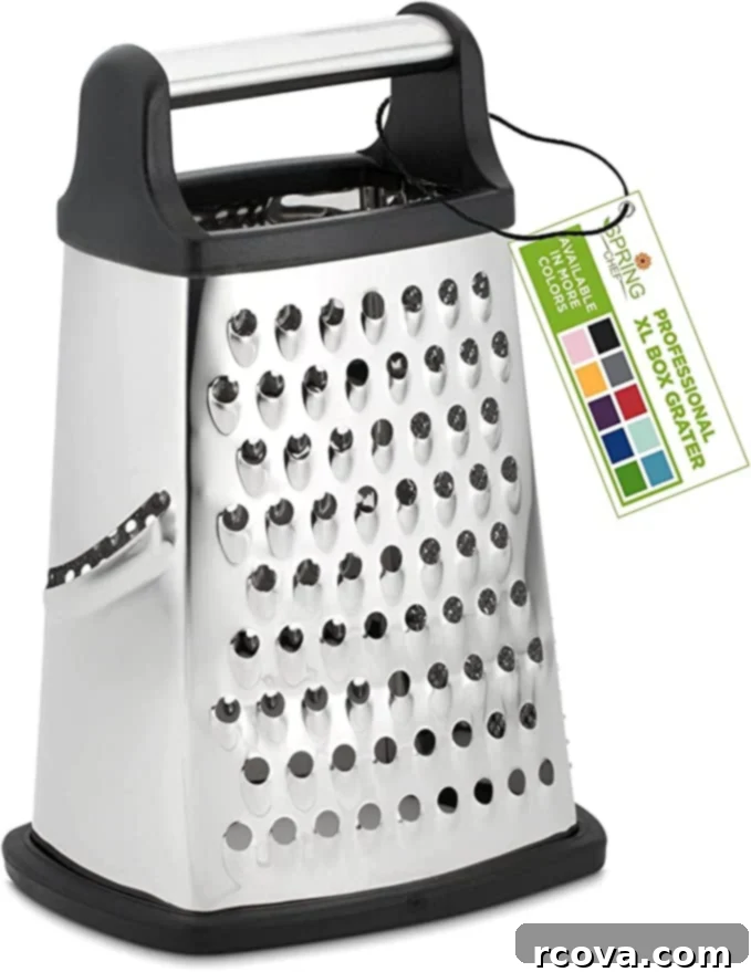 Ultimate Kitchen Setup 20 A stainless steel box grater with four different grating patterns.