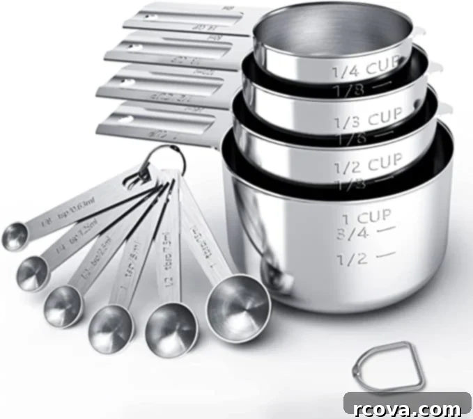 Ultimate Kitchen Setup 5 Silver metal measuring cups and spoons, ideal for precise dry ingredient measurements.