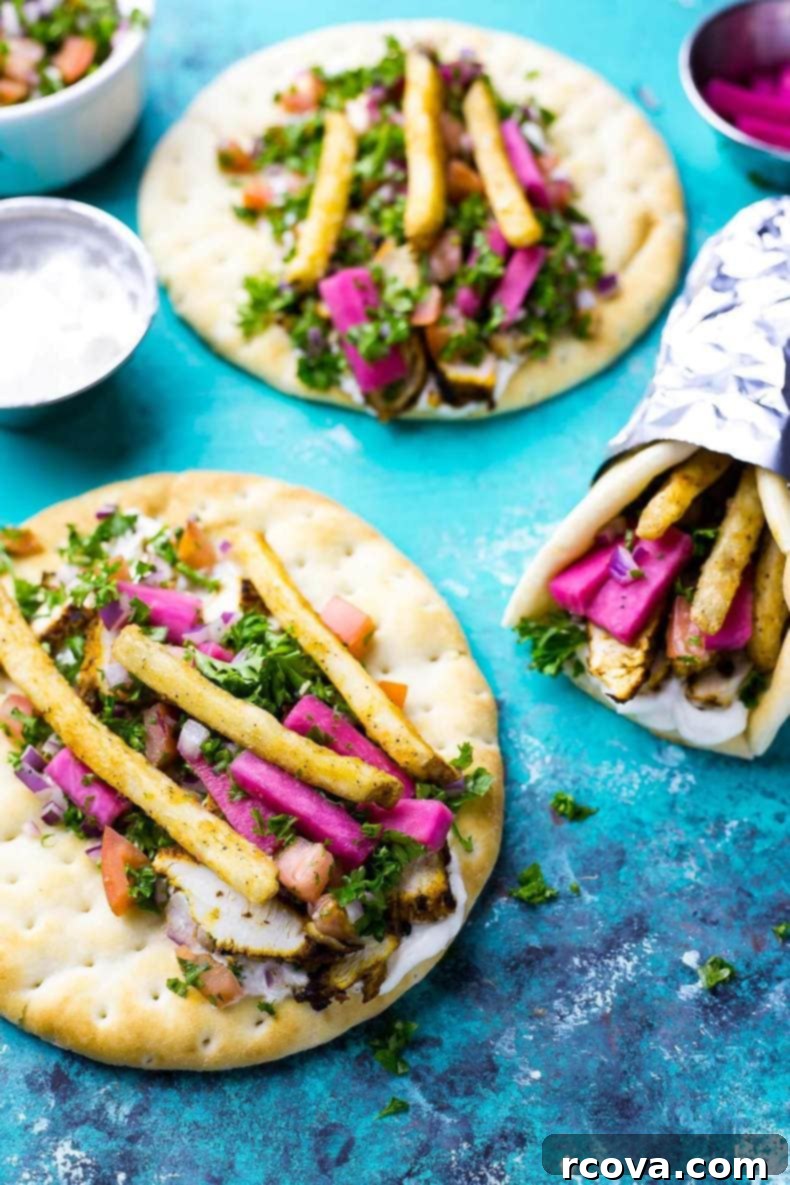 Shawarma Perfection From Your Own Kitchen 6 overhead: thin slices of chicken and vegetables with tabouli on flat pita bread
