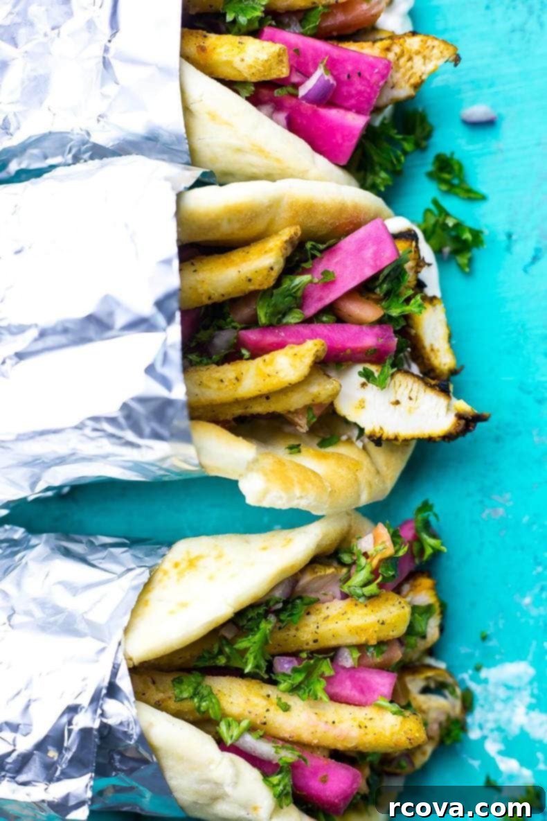 Shawarma Perfection From Your Own Kitchen 7 closeup of chicken shawarma with pickled turnips, tabouli, and garlic sauce