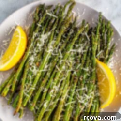Crispy Air Fryer Asparagus 10 A plate of garlic parm air fryer asparagus.
