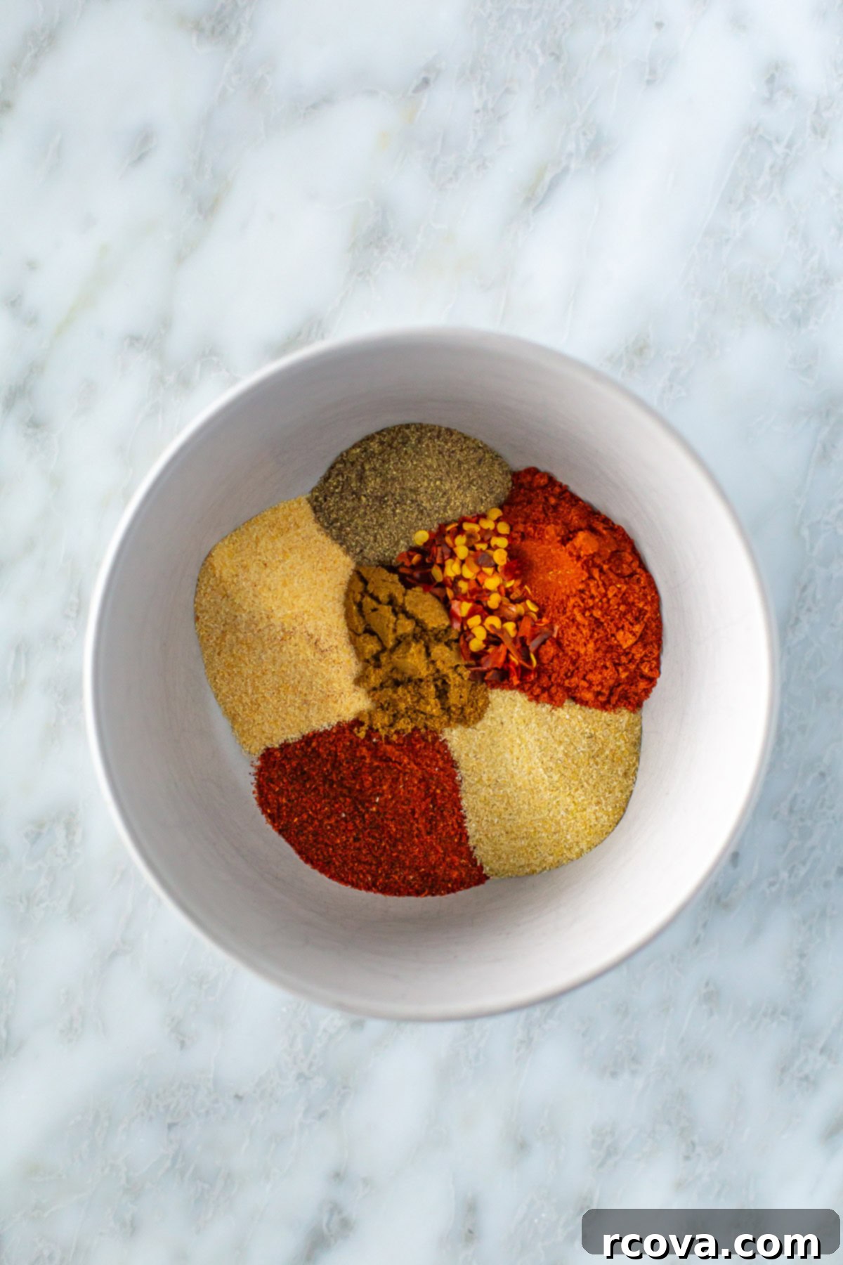 Simple Homemade Taco Seasoning And Jar Labels 2 Bowl of spices making up the homemade taco seasoning