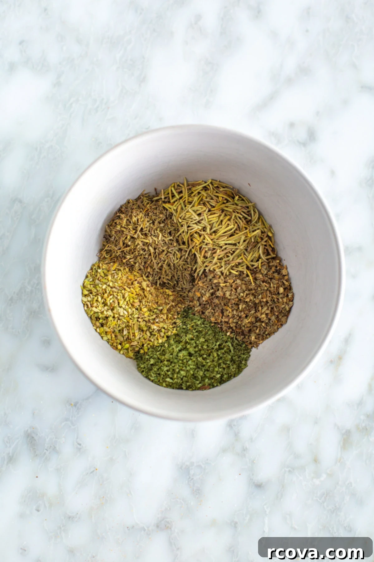 Effortless Homemade Italian Seasoning Never Buy Again 2 Bowl of spices making up the homemade Italian seasoning