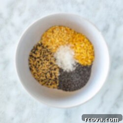 Everything Bagel Seasoning That Outperforms TJs 4 Bowl of spices making up the homemade everything bagel seasoning
