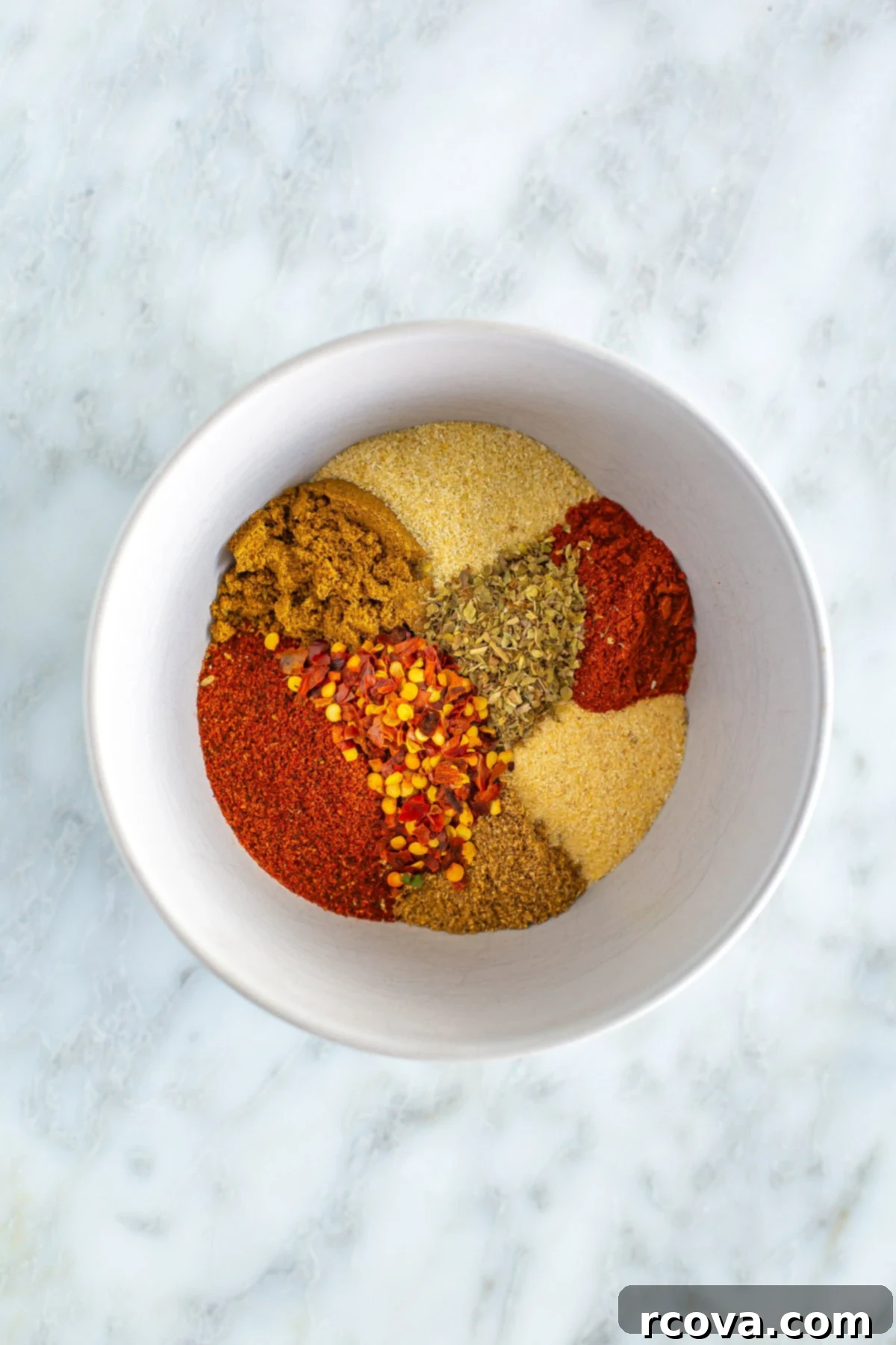 Effortless Fajita Spice Blend 2 Bowl of various spices ready to be mixed for homemade Fajita Seasoning