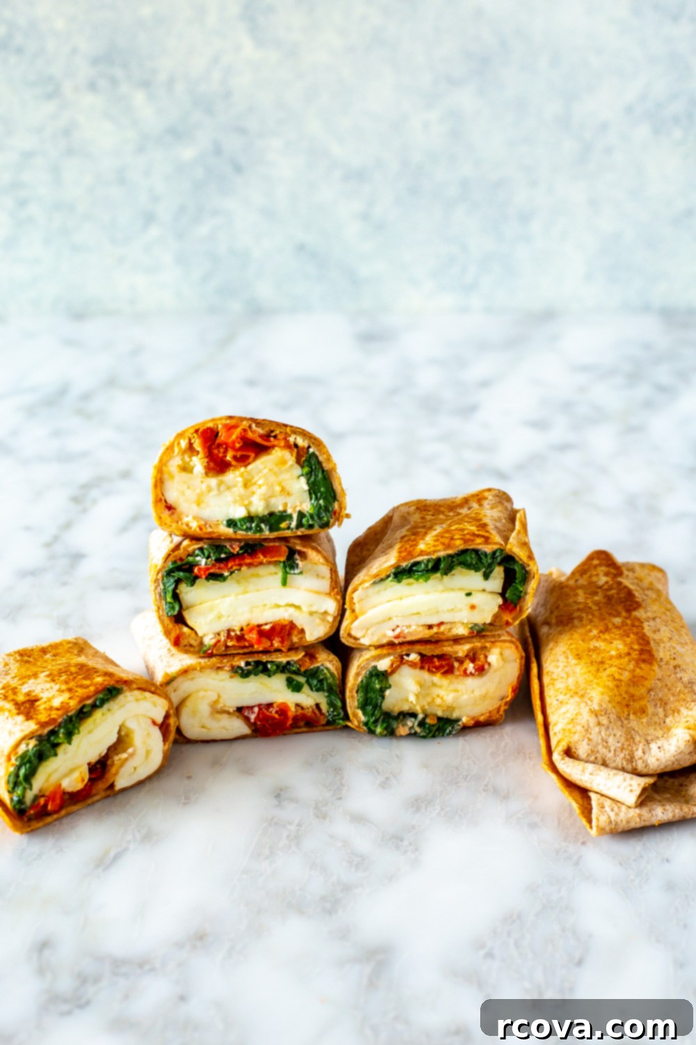 35+ Healthy and Easy Recipes Under 500 Calories 13 A perfectly replicated Starbucks Spinach Feta Wrap, toasted and ready to enjoy, showcasing its wholesome ingredients.