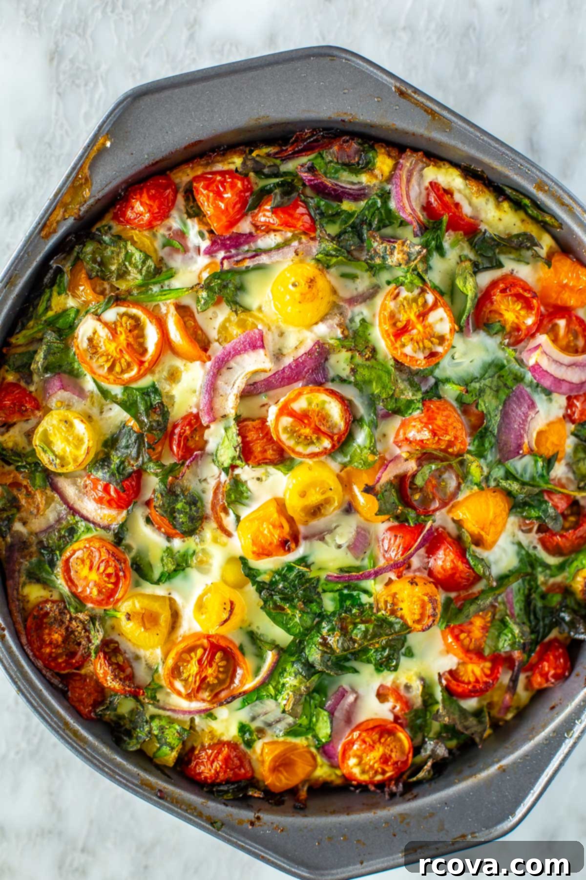 35+ Healthy and Easy Recipes Under 500 Calories 14 A light and fluffy egg white frittata, beautifully baked in a pan and ready for serving, showcasing its simple elegance.