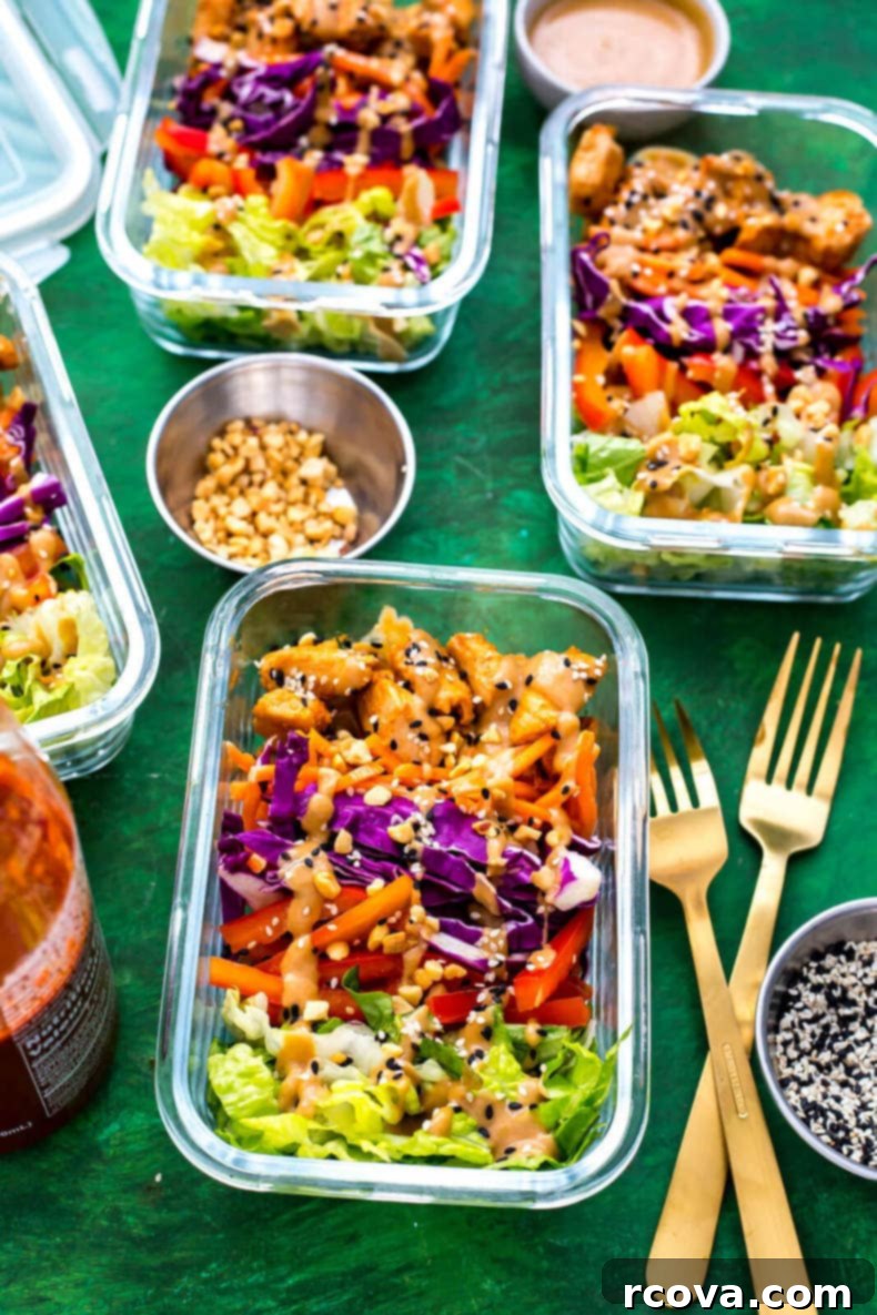 35+ Healthy and Easy Recipes Under 500 Calories 22 Visually appealing Peanut Chicken Meal Prep Bowls, packed with sautéed chicken, colorful veggies, and a rich peanut sauce, all low-carb.