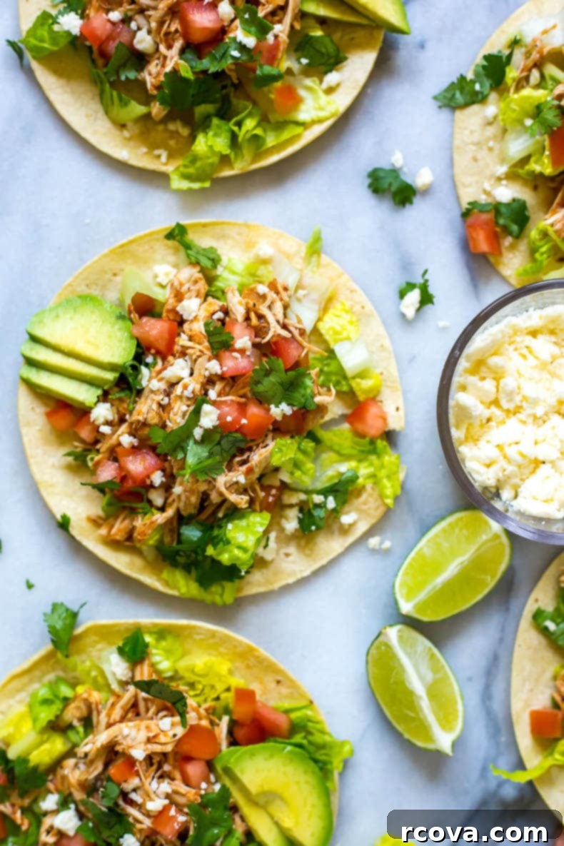 35+ Healthy and Easy Recipes Under 500 Calories 39 Delicious Instant Pot Chicken Tinga Tacos, featuring tender chicken, chipotle, and fire-roasted tomatoes, ready in 30 minutes.