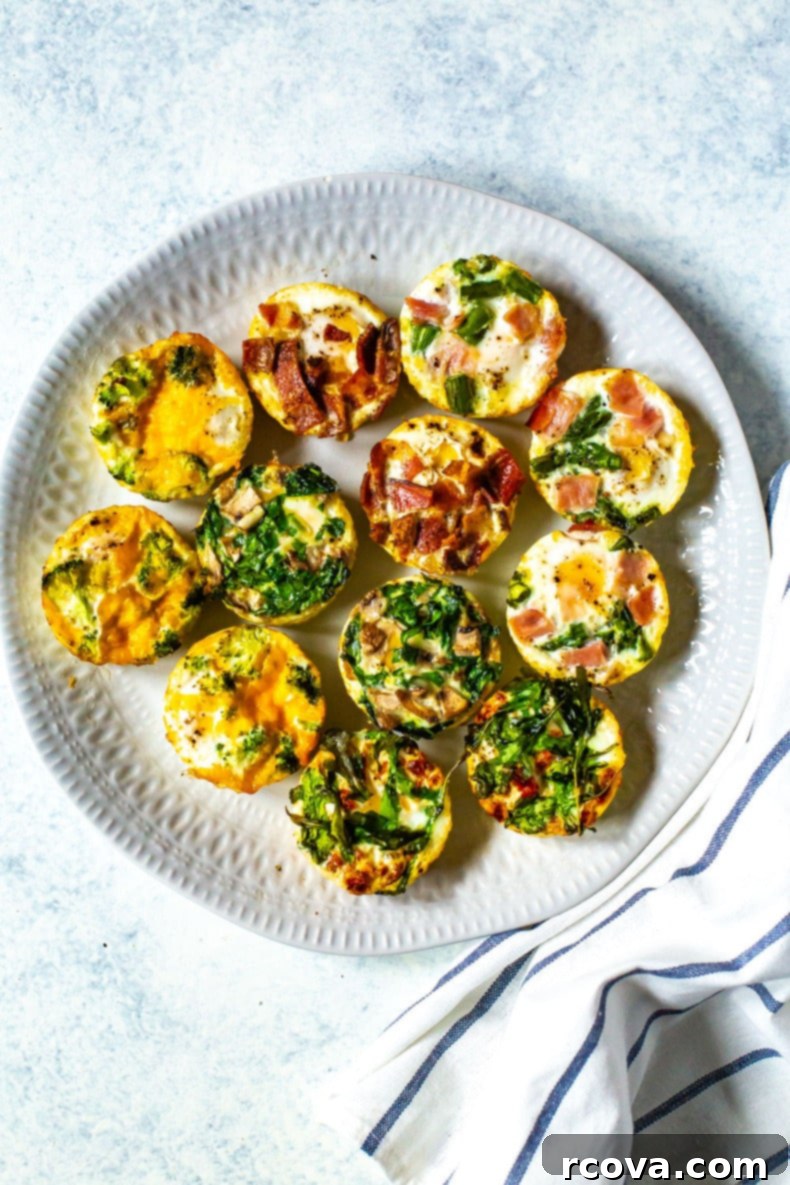 35+ Healthy and Easy Recipes Under 500 Calories 6 A beautifully arranged plate featuring a dozen baked eggs in various flavors, artfully presented next to a crisp napkin.