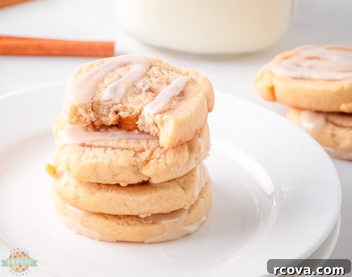 Cinnamon Bun Bliss Cookies 7 Freshly sliced cinnamon roll cookies with visible swirls, ready for baking.