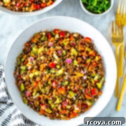 The Ultimate Lentil Salad Recipe 10 A bowl of fresh lentil salad with a napkin underneath, ready to be enjoyed.