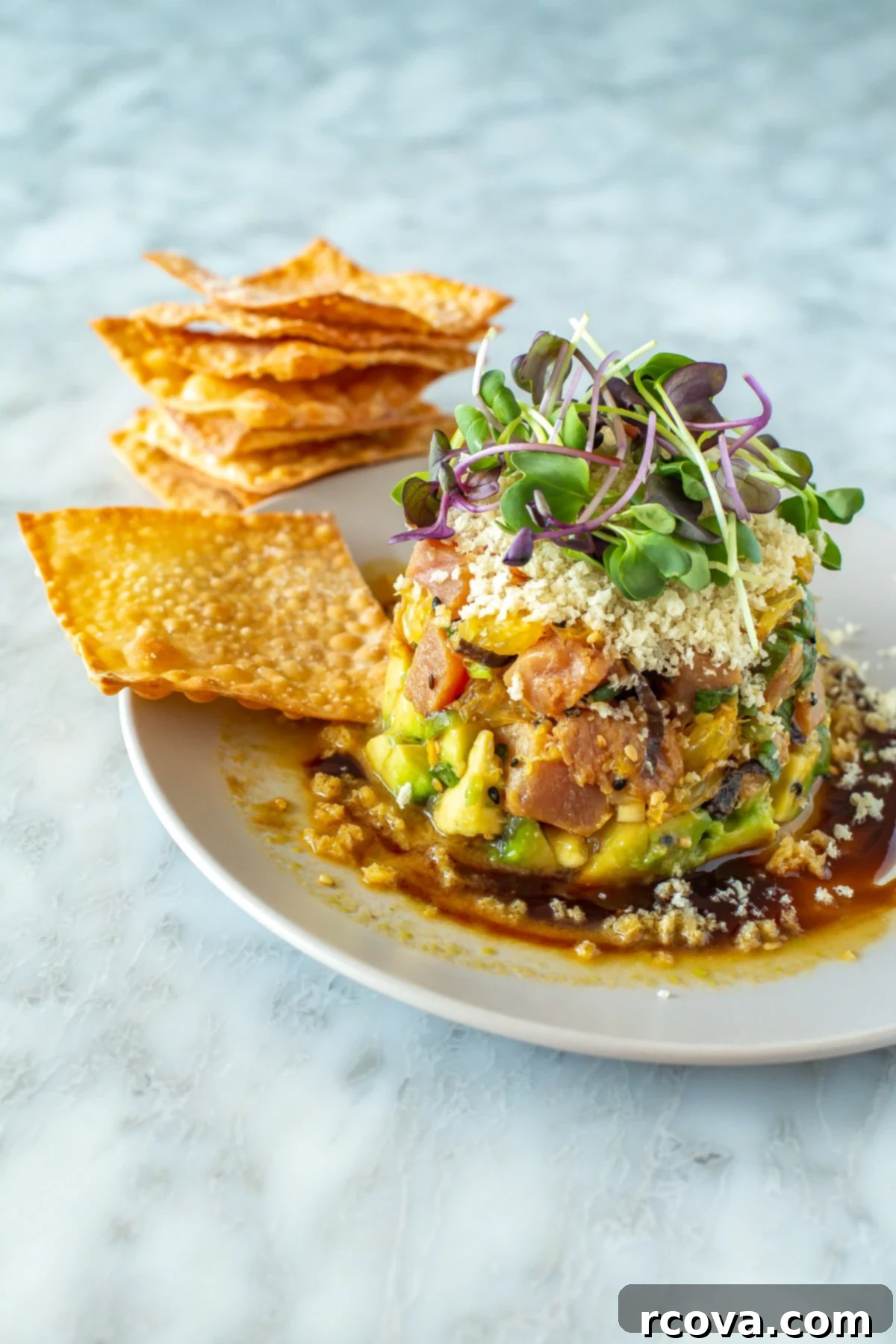 35+ Effortless Pescatarian Meal Prep Recipes for a Balanced Week 33 Tuna Stack, a gourmet-looking appetizer or light meal with fresh ingredients.