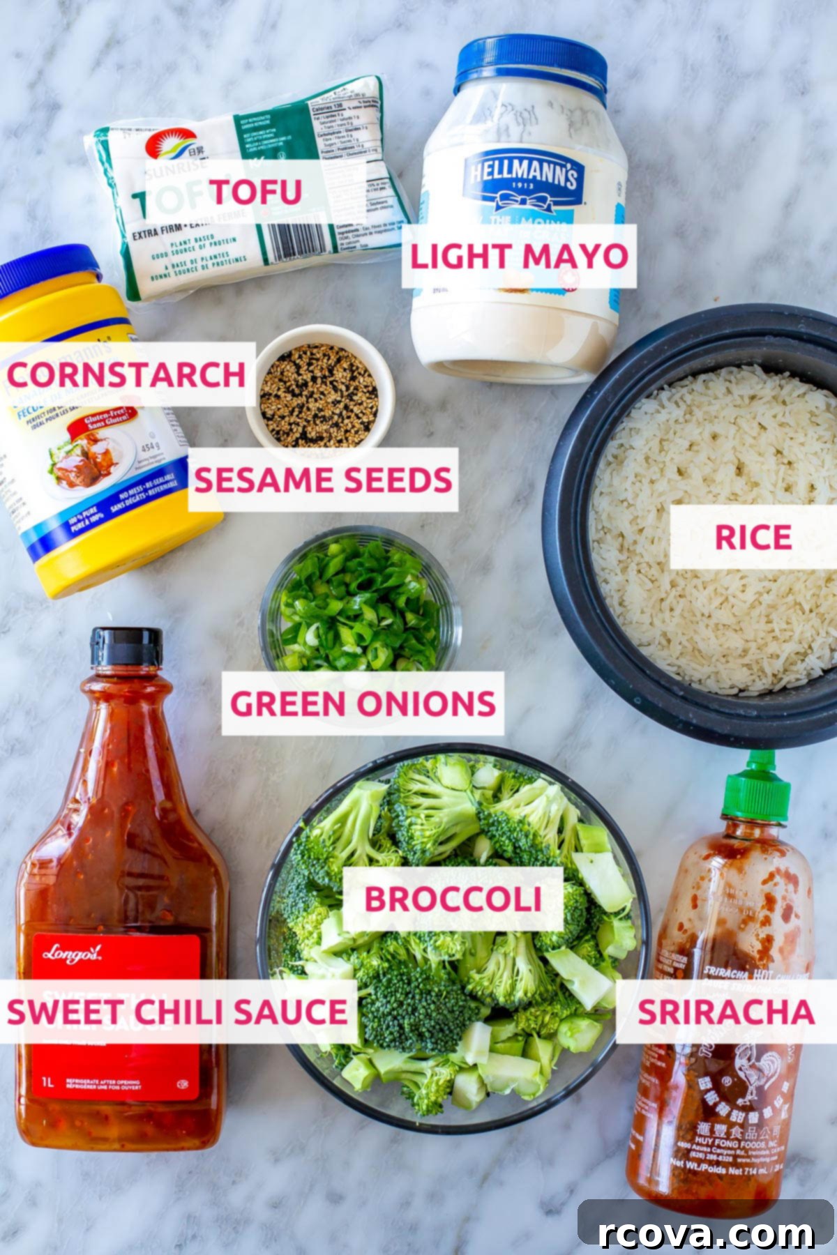 Master Crispy Air Fryer Tofu with Our Ultimate Sauce 4 Ingredients for air fryer tofu: block of tofu, light mayonnaise, cornstarch, sesame seeds, chopped green onions, sweet chili sauce, fresh broccoli florets, and sriracha hot sauce.