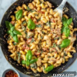 Effortless Creamy Sun-Dried Tomato Pasta 11 A skillet with creamy sundried tomato pasta, ready to be served.