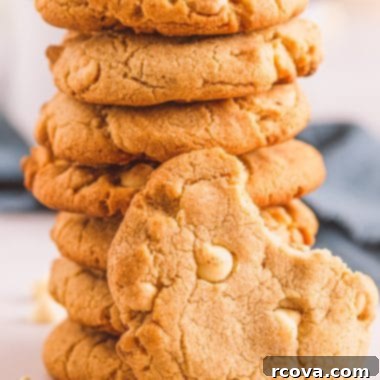 Spiced White Chocolate Crunch Cookies 8 A stack of freshly baked Crunchy White Chocolate Cinnamon Cookies