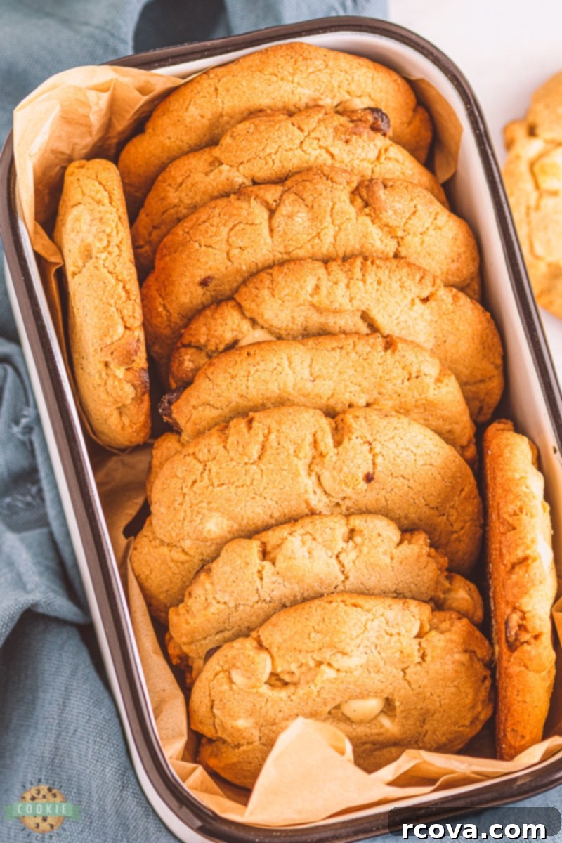 Spiced White Chocolate Crunch Cookies 9 Freshly baked white chocolate cinnamon cookies cooling on a rack