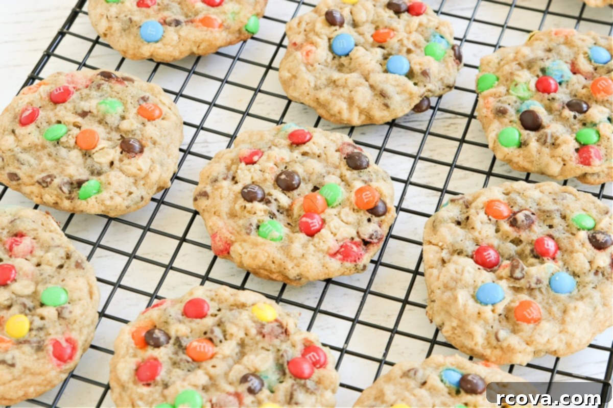 Colorful M and M Oatmeal Cookies 4 A close-up shot of M&M Oatmeal Cookie dough with oats, mini M&Ms, and mini chocolate chips.